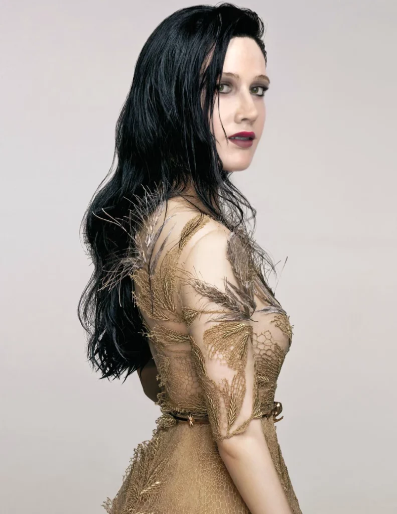 digital-human-golden-dress-feathers-back-hair-closeup-makeup dark lips stick green eyes