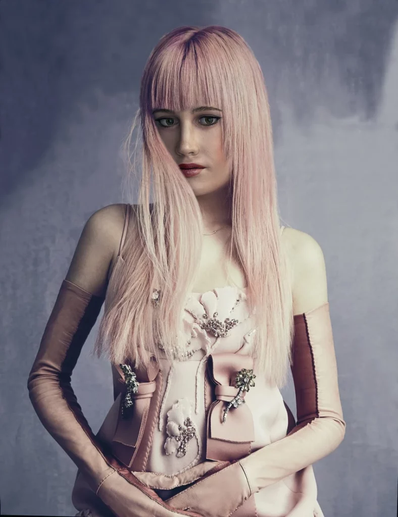 pink hair, long hair, dress, cute/doll aesthetic very dool like long pink gloves dark pink lips stick green eyes long hair barby hair